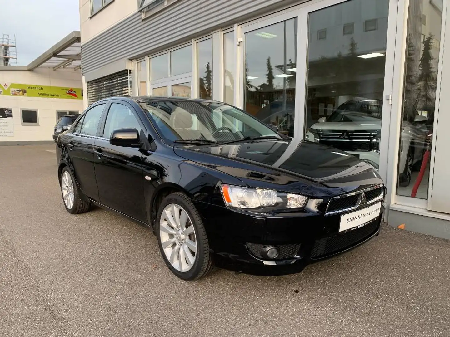 Mitsubishi Lancer Sportlimousine 1.6 ClearTec 5MT Xtra Schwarz - 1