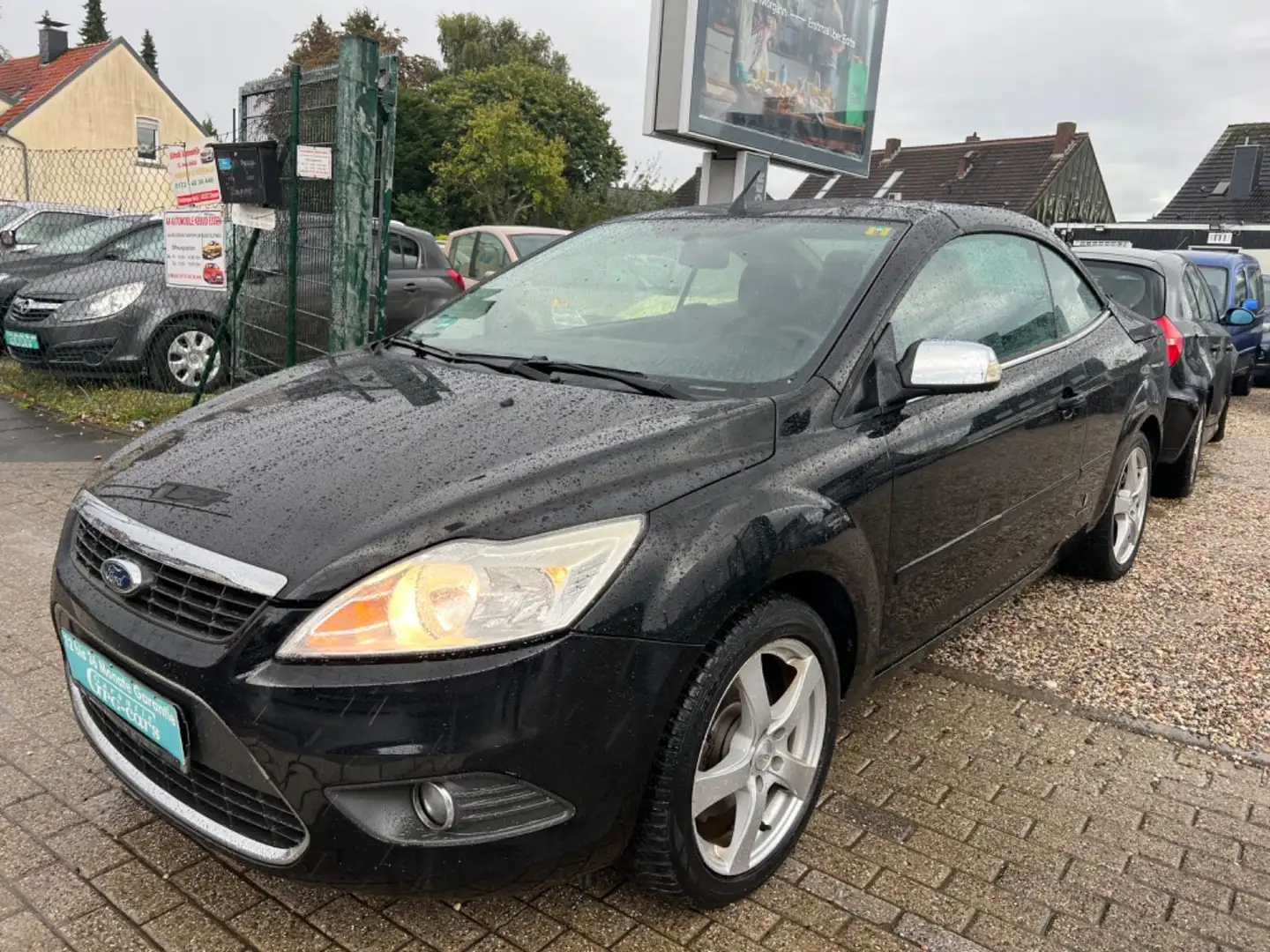 Ford Focus Cabrio Trend*TÜV NEU*2 HAND*KLIMA*TOP* Schwarz - 1