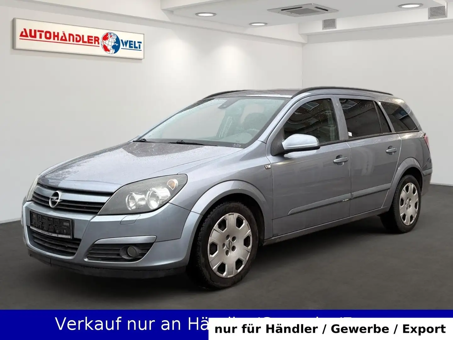 Opel Astra H Kombi 1.6i Automatik AAC SHZ Navi PDC Silber - 1