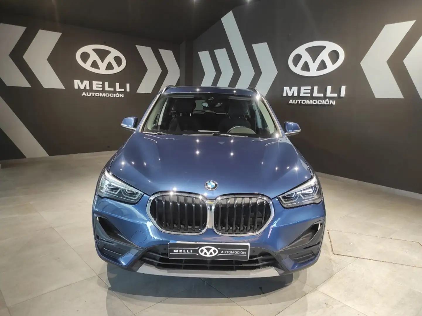 BMW X1 sDrive 18dA Corporate Bleu - 1