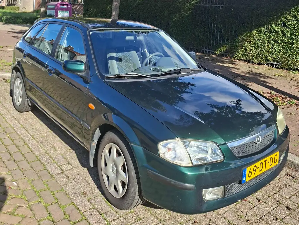 Mazda 323 1999 из Европы — купить под ключ