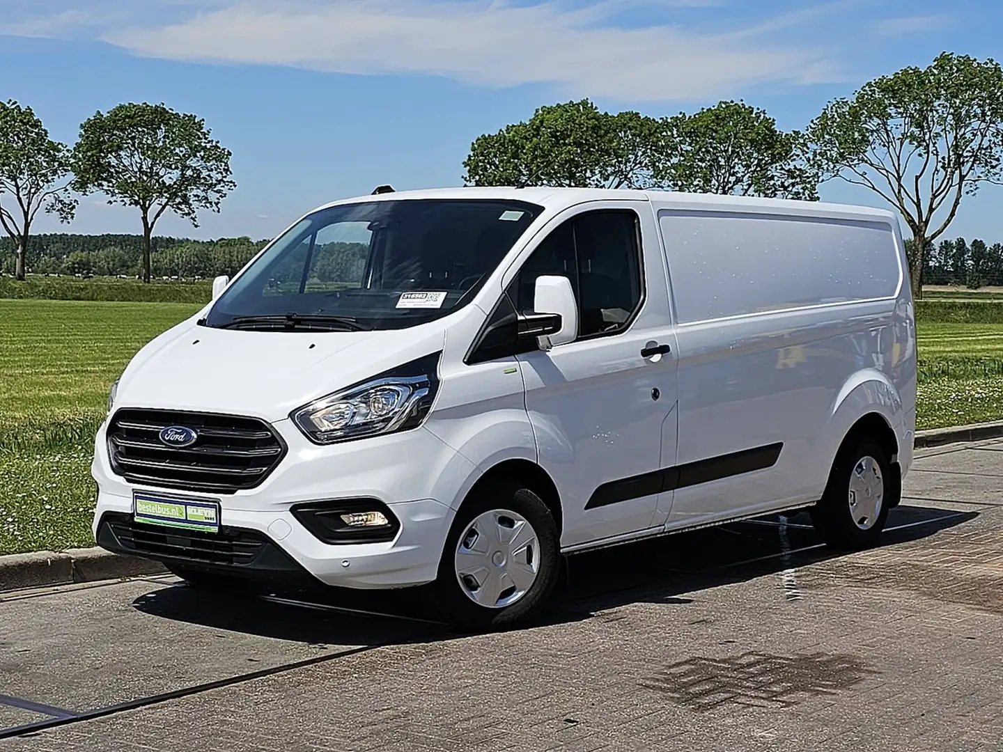 Ford Transit Custom 300 2.0 TDCI L2H1 Trend Airco Navi PDC Cruise Cont Wit - 1
