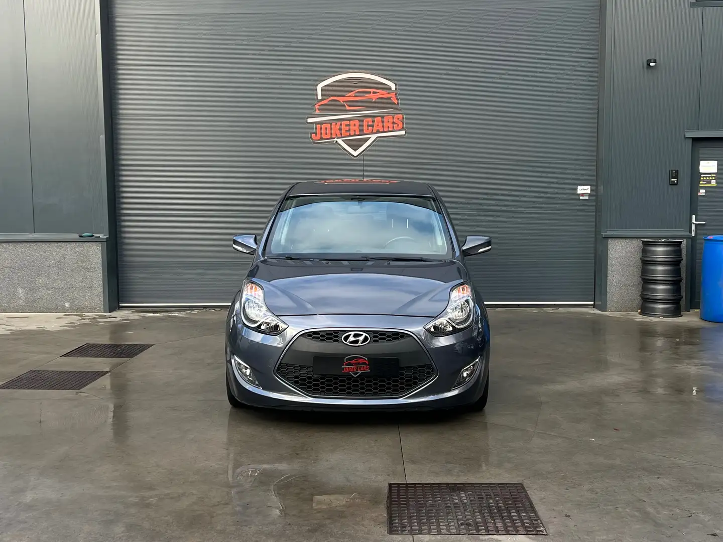 Hyundai iX20 1.4i Navigatie Airco EURO6B Camera Grijs - 1