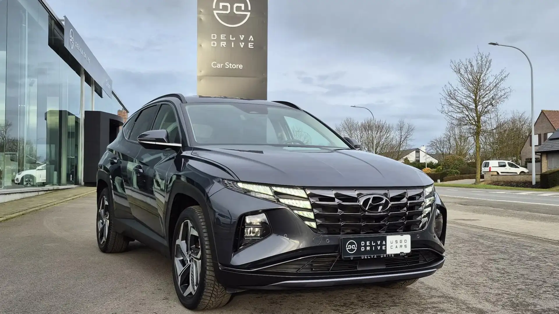 Hyundai TUCSON 1.6 T-GDI PHEV TREND ✅ Plug-in Hybrid 4WD Grijs - 2