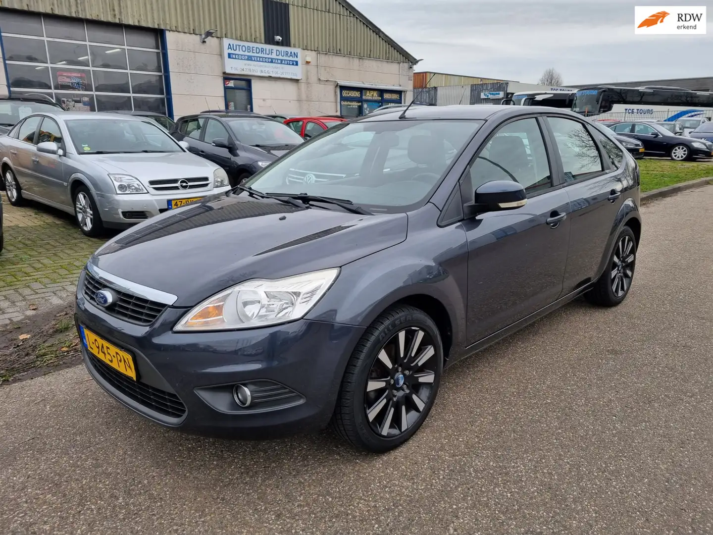 Ford Focus 1.6 Trend 74kw 5-Drs Clima Bj:2011 Grijs - 1