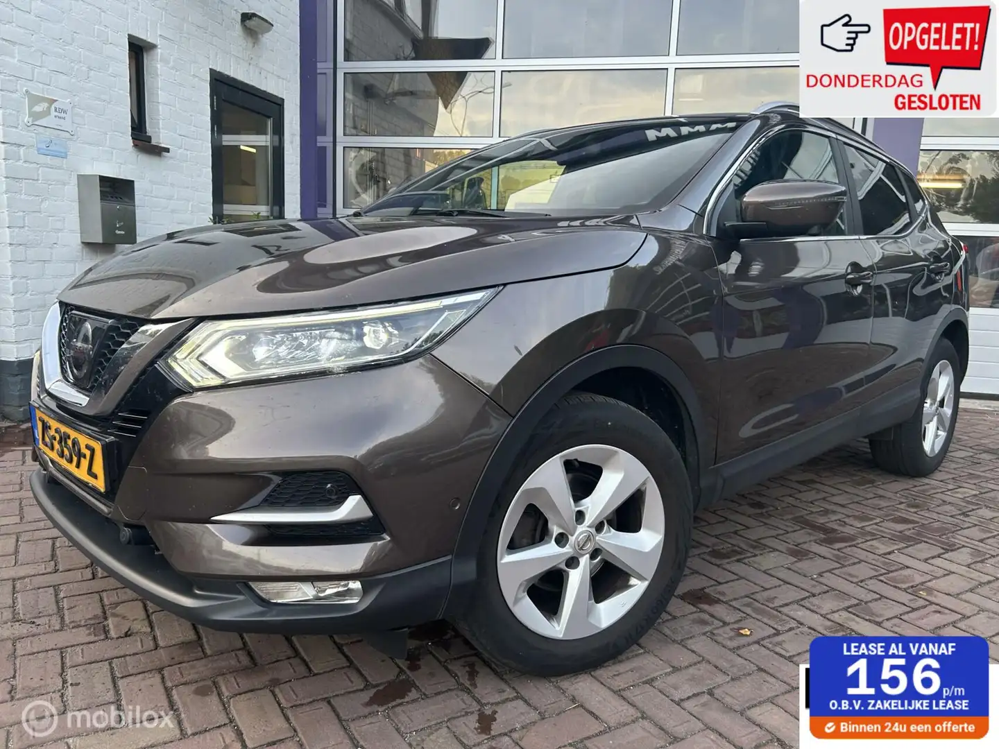 Nissan Qashqai 1.5 dCi Tekna * PANODAK * NAVI * LEDER * Bruin - 1