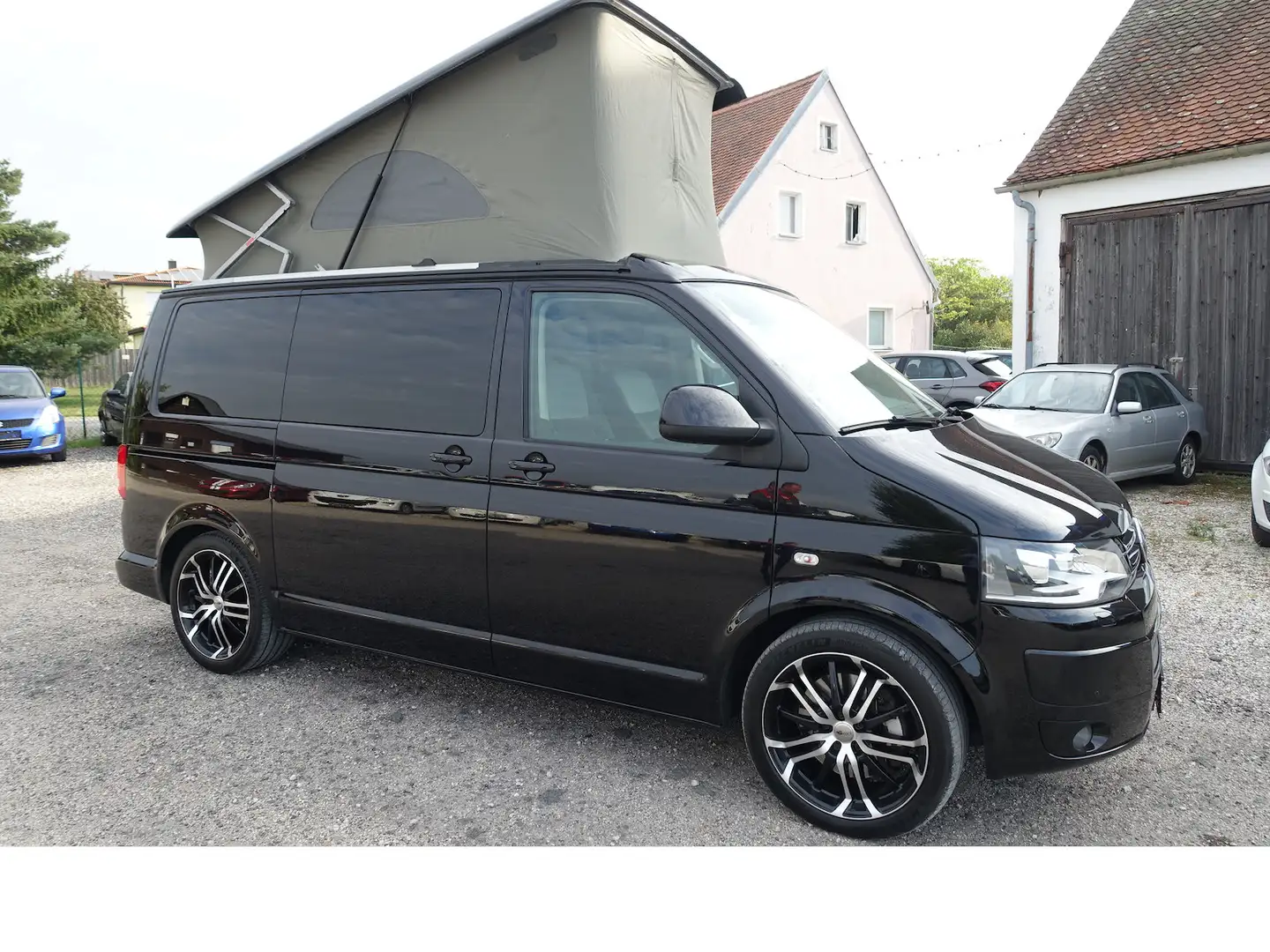 Volkswagen T5 California Beach Aufstelld. ATM 47´km 7. Sitzer AHK 8-fach be Schwarz - 1