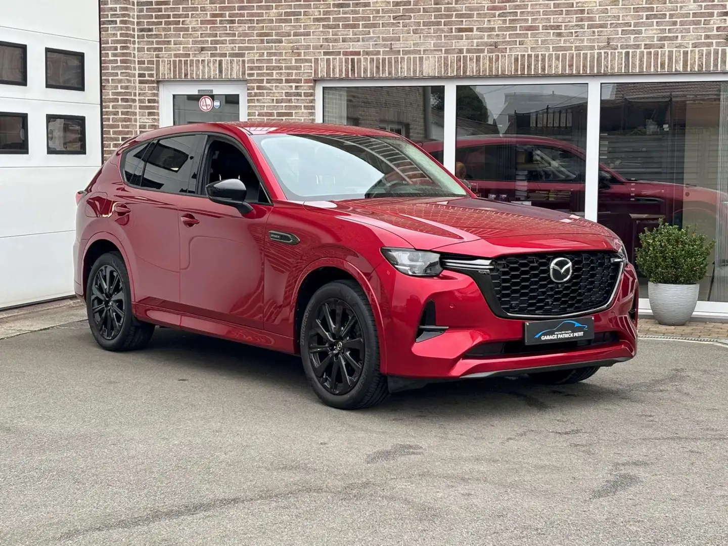 Mazda CX-60 CX-60 2.5 PHEV HOMURA / Bose / 360 camera Rood - 1