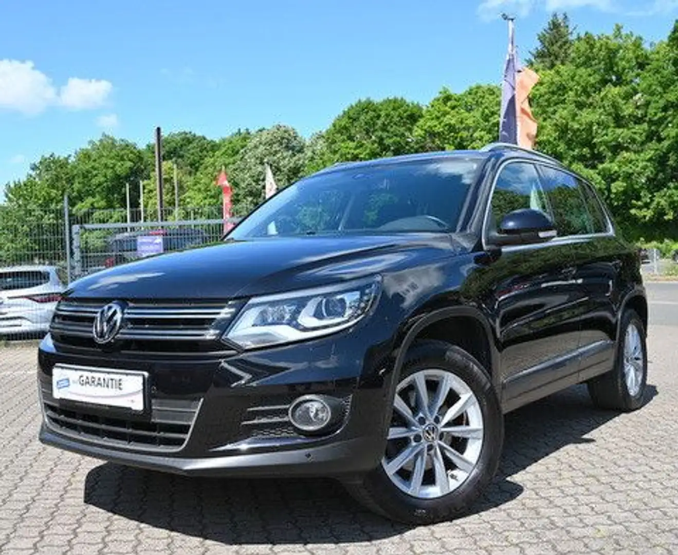 Volkswagen Tiguan 1.4 TSI Sport & Style 4Motion Cam Xenon Schwarz - 1