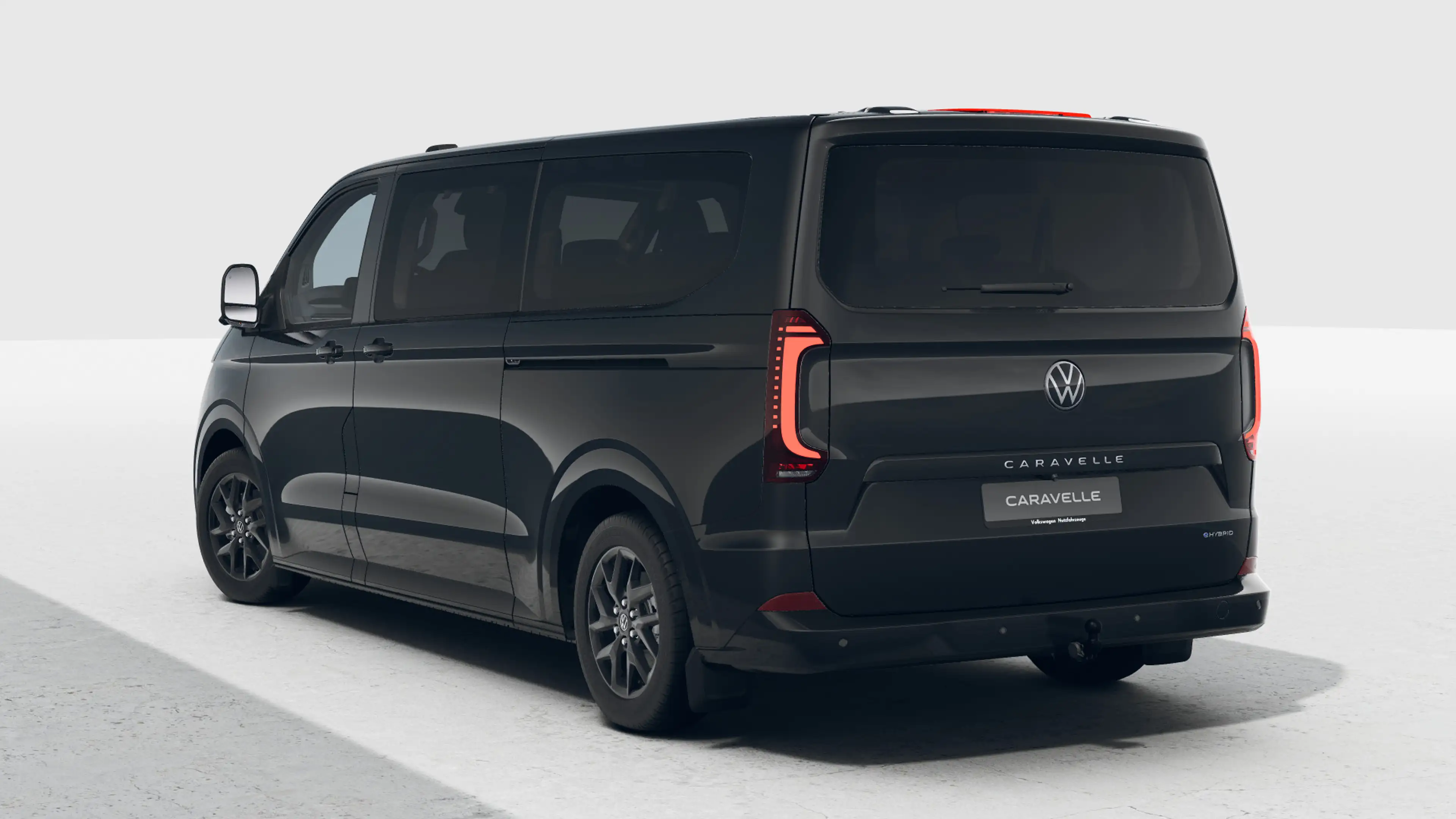Volkswagen Transporter Caravelle 2.5 L2H1 233pk eHybrid Style | Panoramad — photo 2