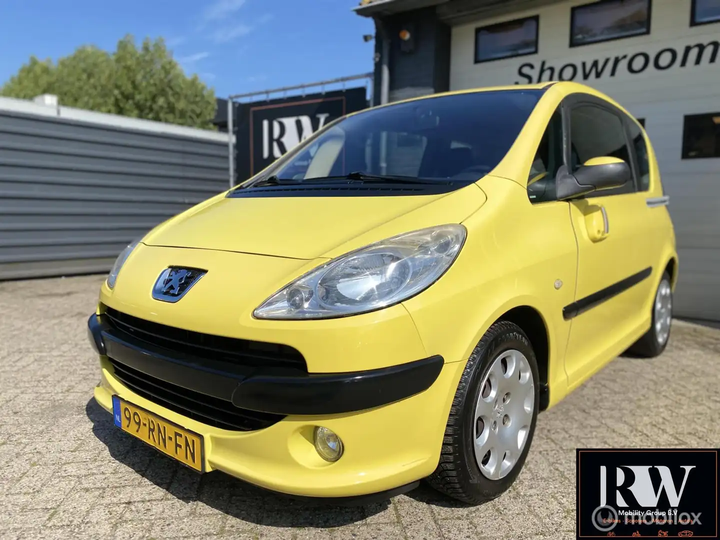 Peugeot 1007 1.4 Gentry *Airco*APK 4-2026*Elektrische deuren Geel - 1