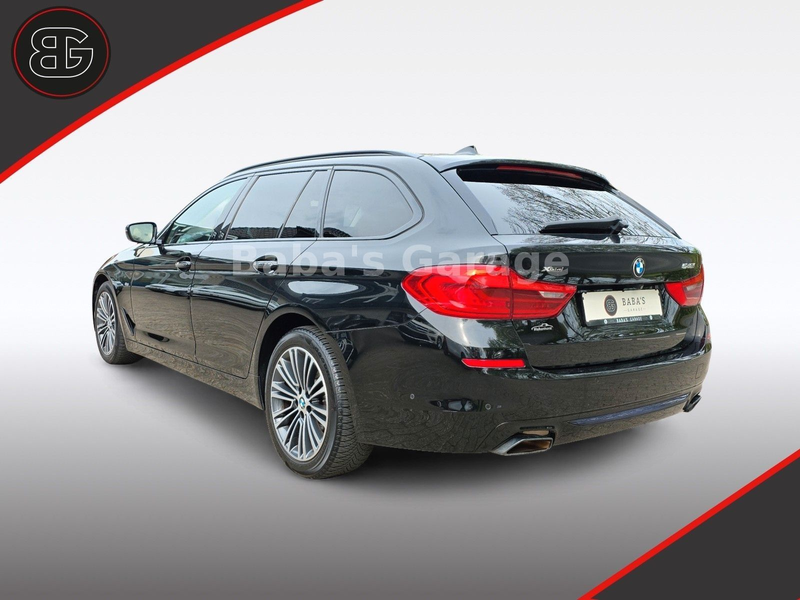 BMW 540 i Touring xDrive Sport Line — photo 6