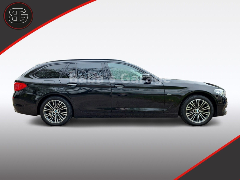 BMW 540 i Touring xDrive Sport Line — photo 9