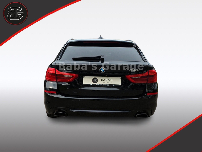 BMW 540 i Touring xDrive Sport Line — photo 7