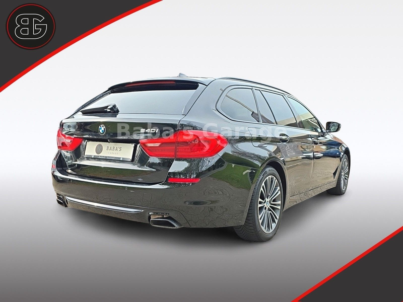 BMW 540 i Touring xDrive Sport Line — photo 8