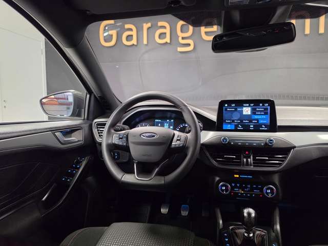 Ford Focus — photo 10