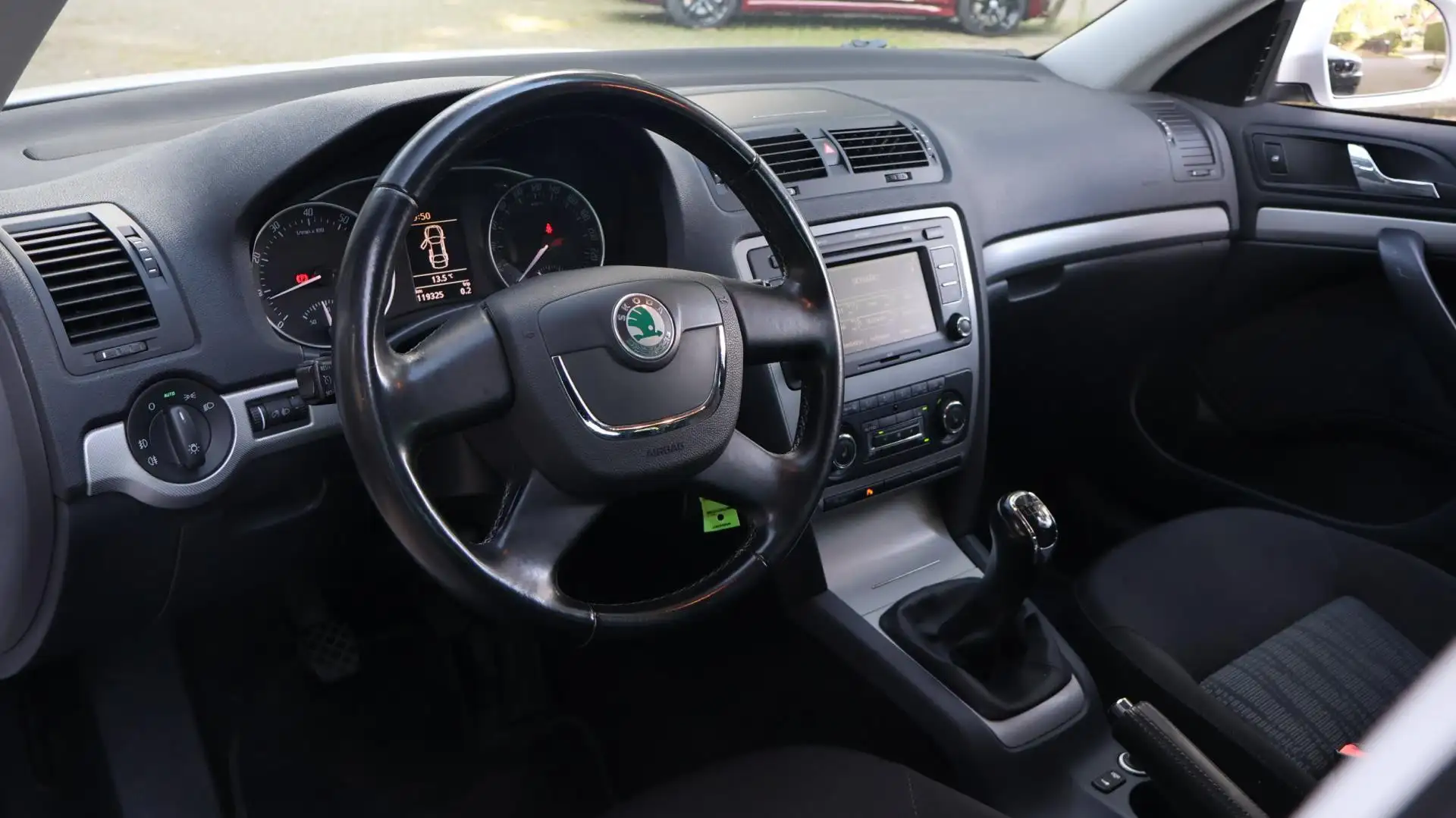 Skoda Octavia Combi 1.2 TSI Elegance|Xenon|Cruise|PDC|BT|LMV Wit - 2