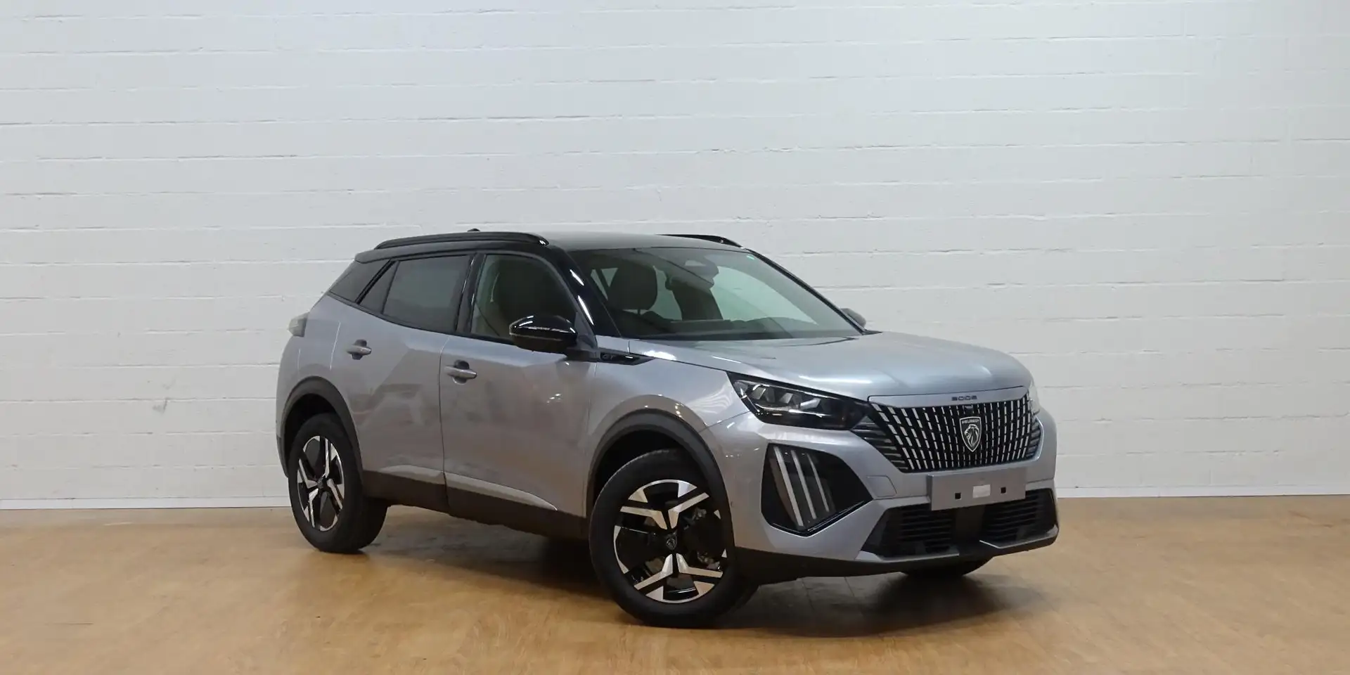 Peugeot 2008 1.2 HYBRID GT Pano Dak, Navigatie, Camera Grau - 2