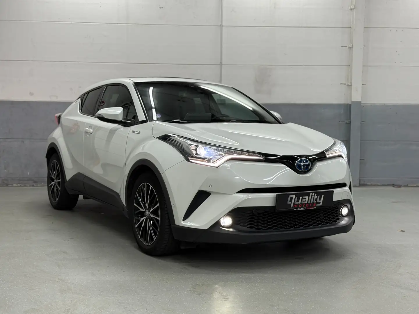 Toyota C-HR C-HR Hybrid Lounge // SCHUIFDAK // TOYOTA WARANTY Wit - 1