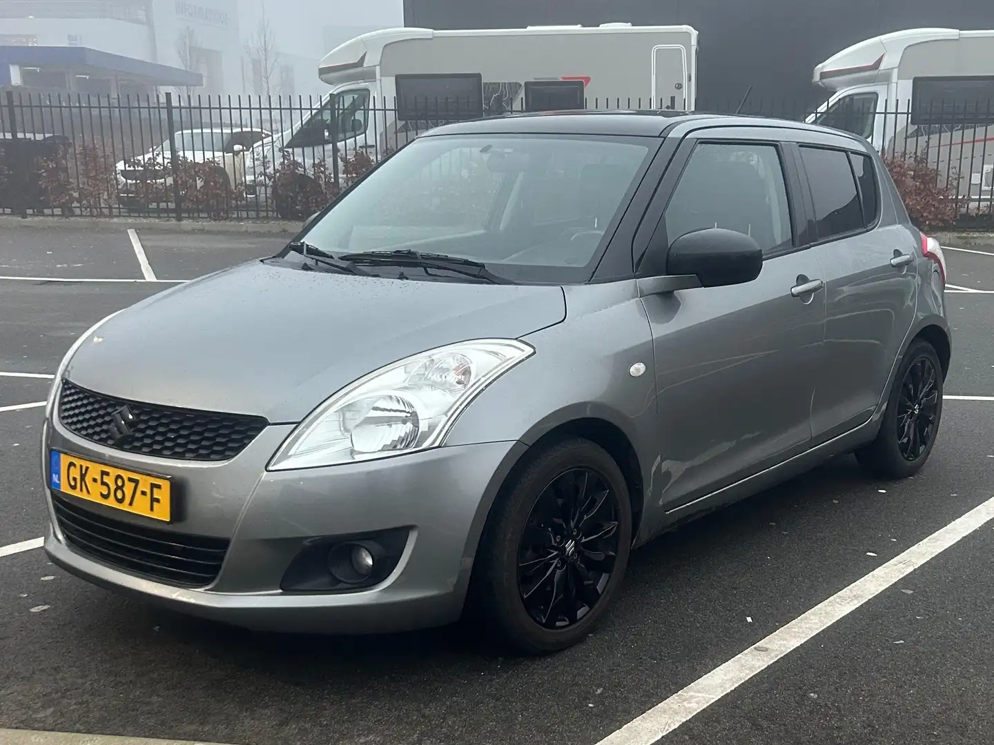 Suzuki Swift Swift 1.2 Exclusive Grijs - 2