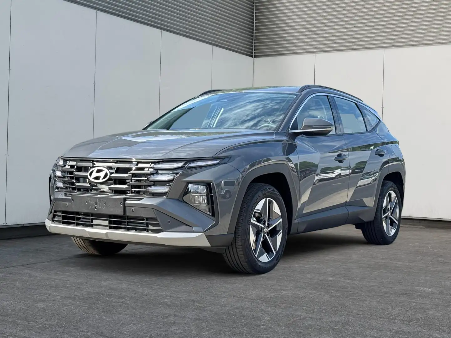 Hyundai TUCSON Style Hybrid NAVI+KAMERA+SHZ+LED+TEMPOMAT+17" A... Grau - 1