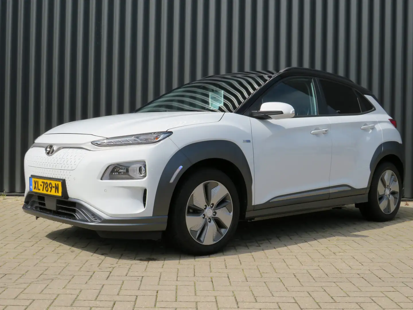 Hyundai KONA EV Premium 64 kWh | Leder interieur | Navigatie | Wit - 2