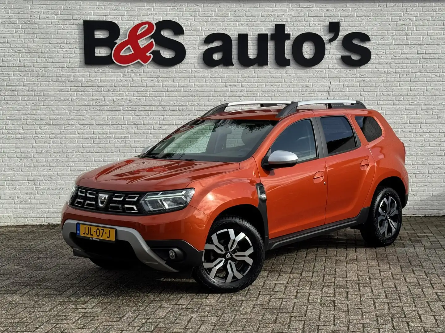 Dacia Duster 1.3 TCe Prestige Achteruitrijcamera Cruisecontrol Oranje - 1
