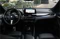 BMW X1 sDrive18i Executive M Sport Automaat / Sportstoele Grijs - thumbnail 4