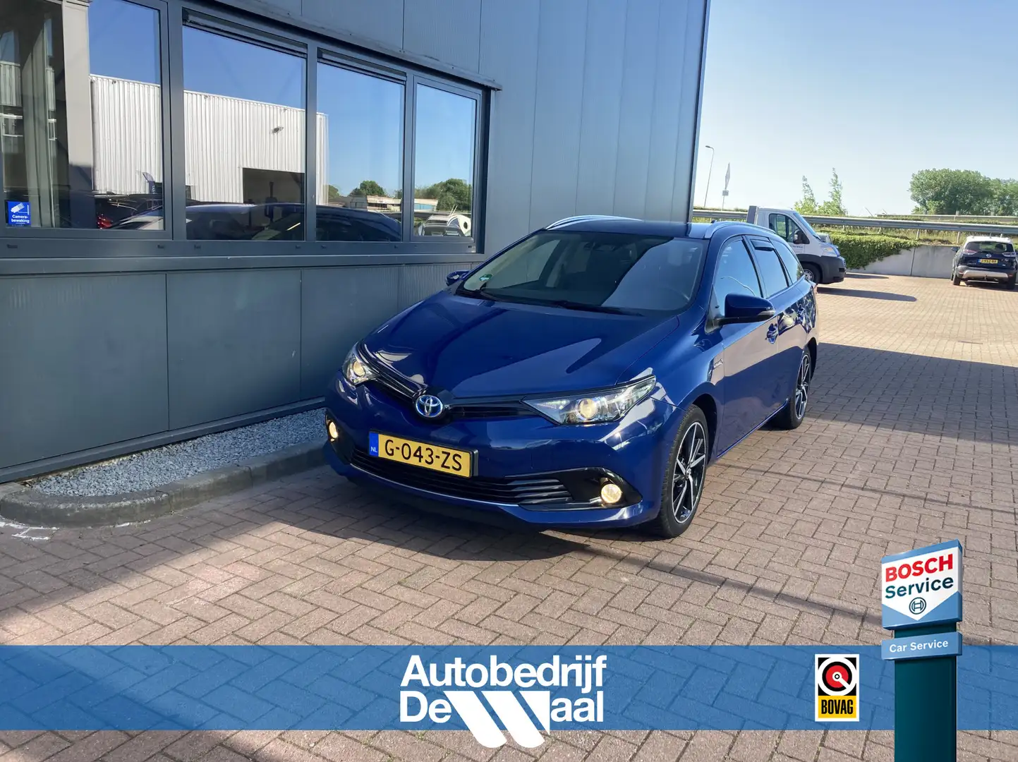 Toyota Auris Touring Sports 1.8 Hybrid Dynamic Ultimate KEYLESS Blauw - 1