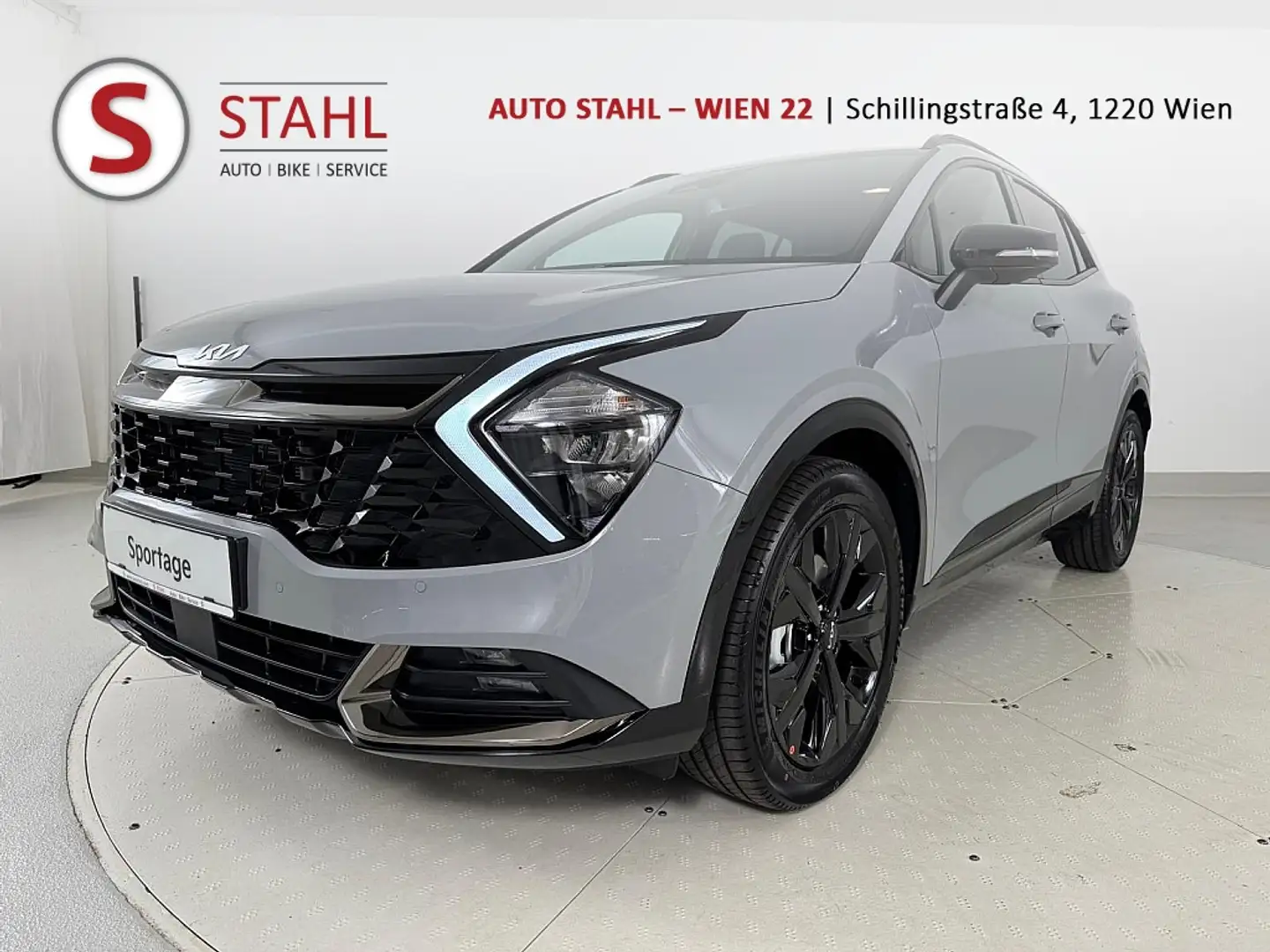 Kia Sportage 1,6 TGDI 48V Anniversary DCT | Stahl Wien 22 Gris - 1