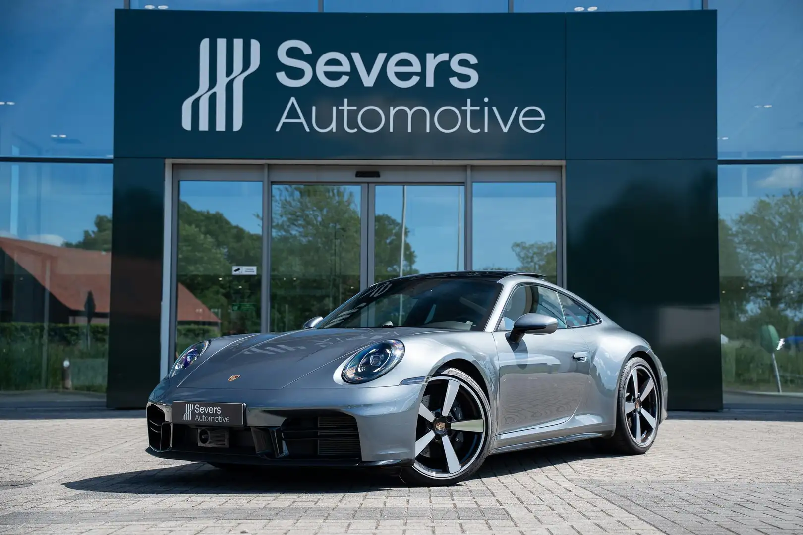 Porsche 992 3.0 Carrera | SportDesign Pakket | BOSE Surround S Grijs - 1