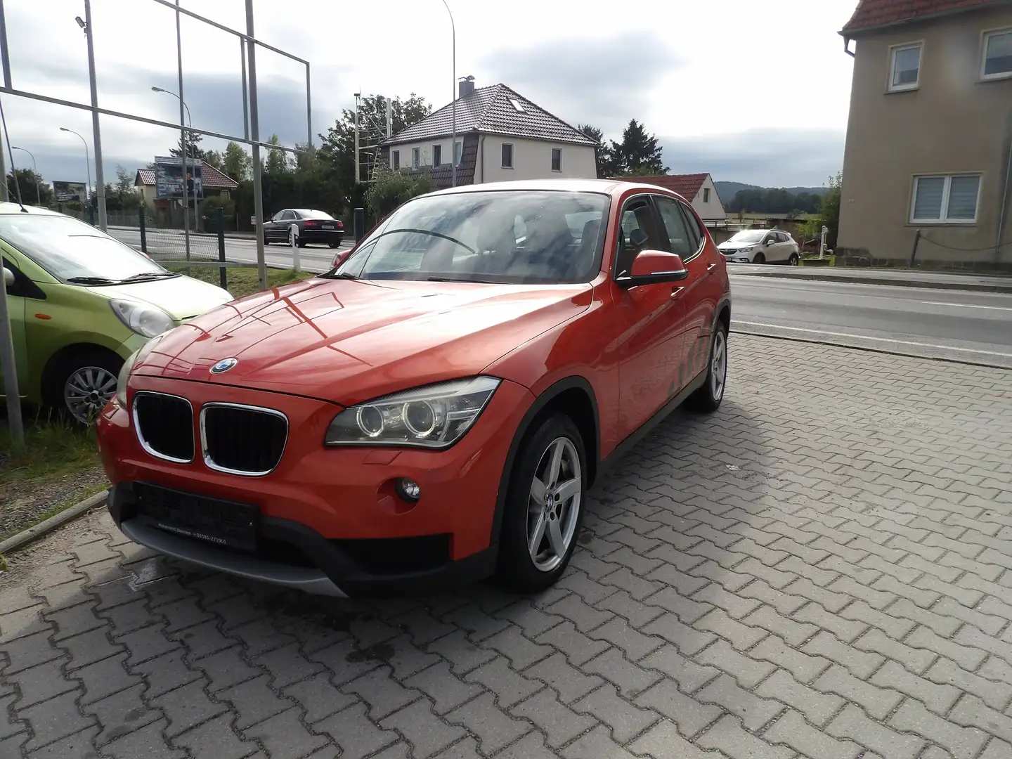 BMW X1 18 d PDC AHK Alu. Sitzheiz. Klima Radio HU AU Neu Arancione - 1