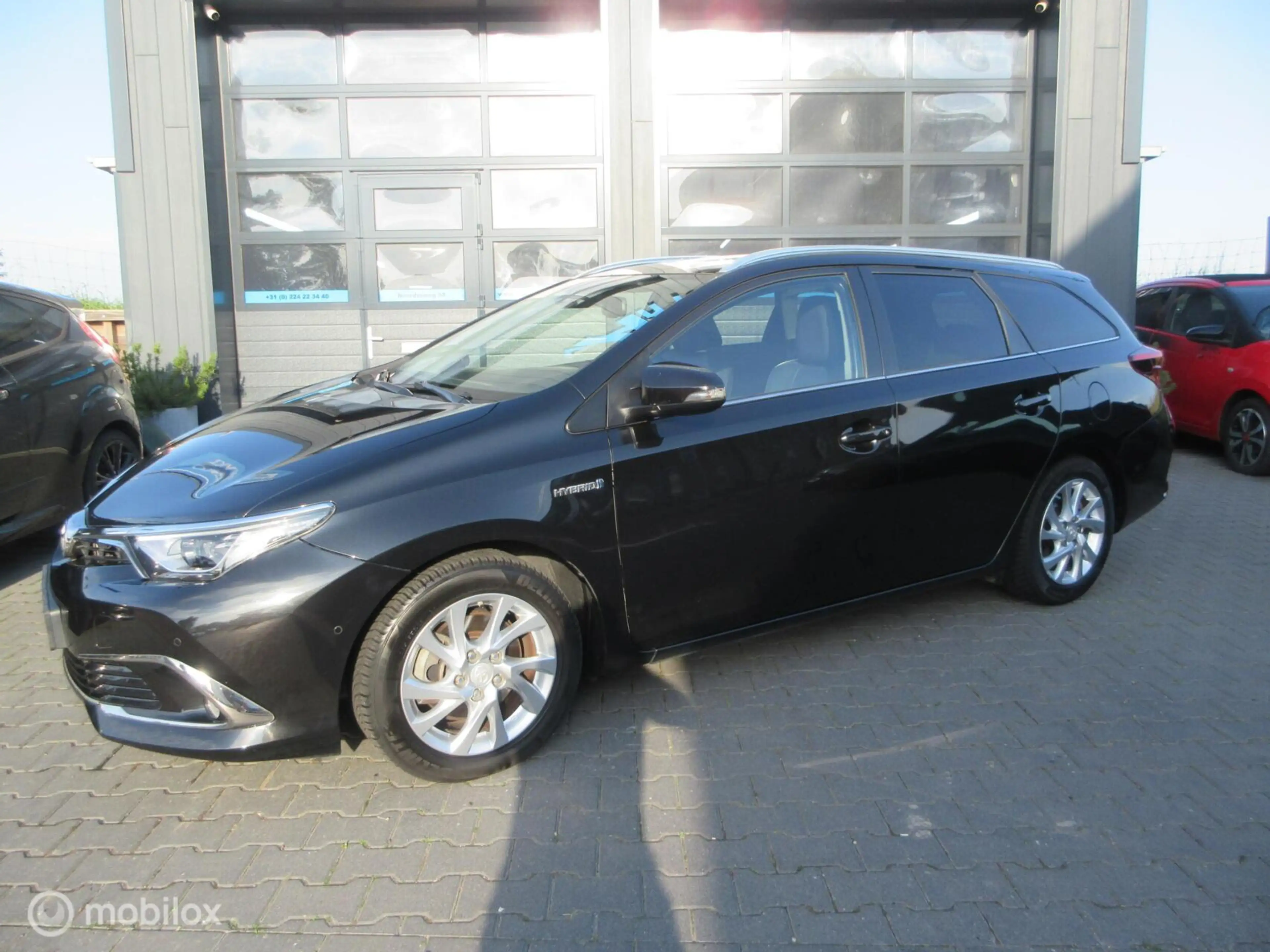 Toyota Auris Touring Sports 1.8 Hybrid Lease pro Trekhaak NL au