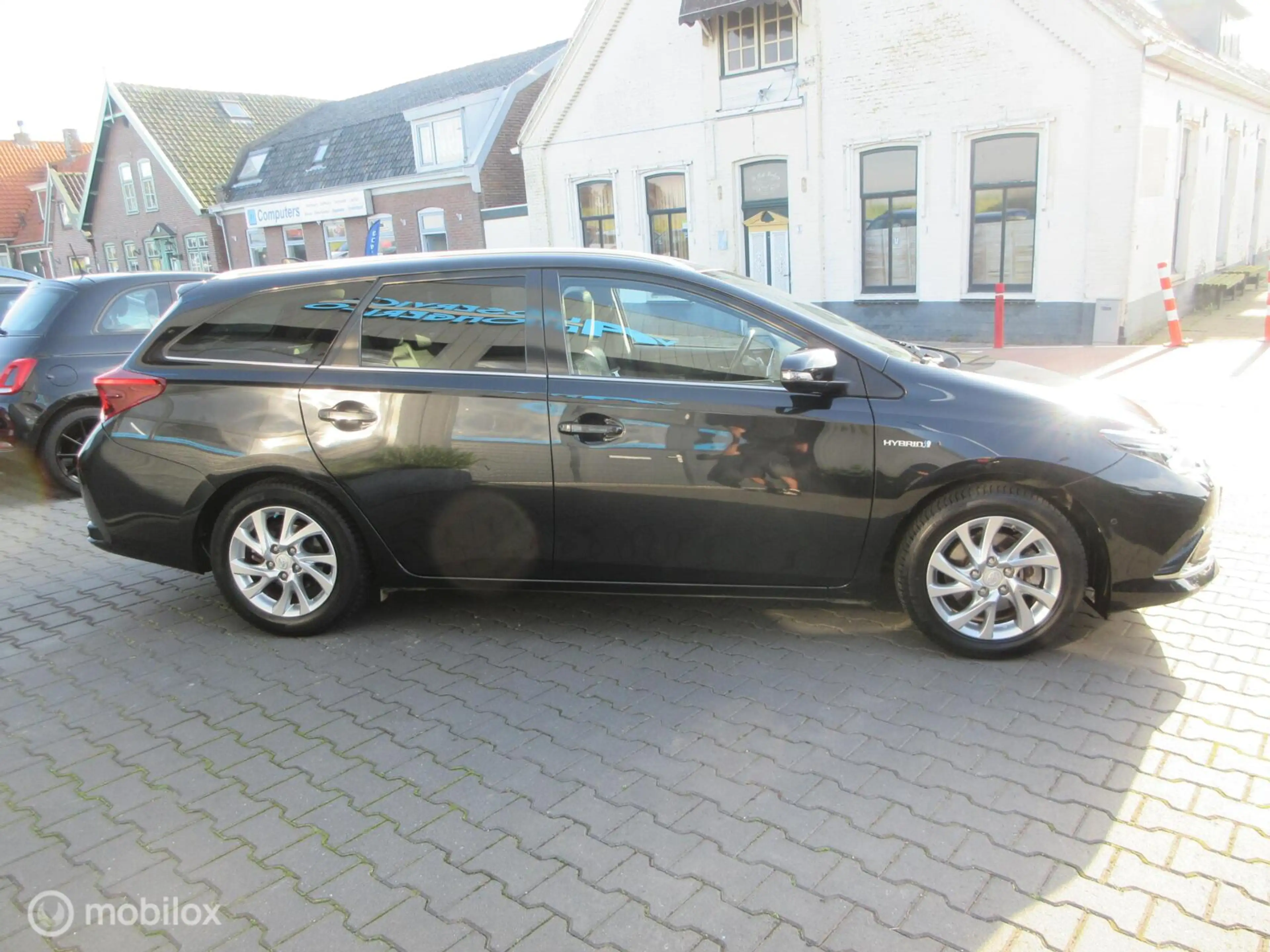 Toyota Auris Touring Sports 1.8 Hybrid Lease pro Trekhaak NL au — photo 7