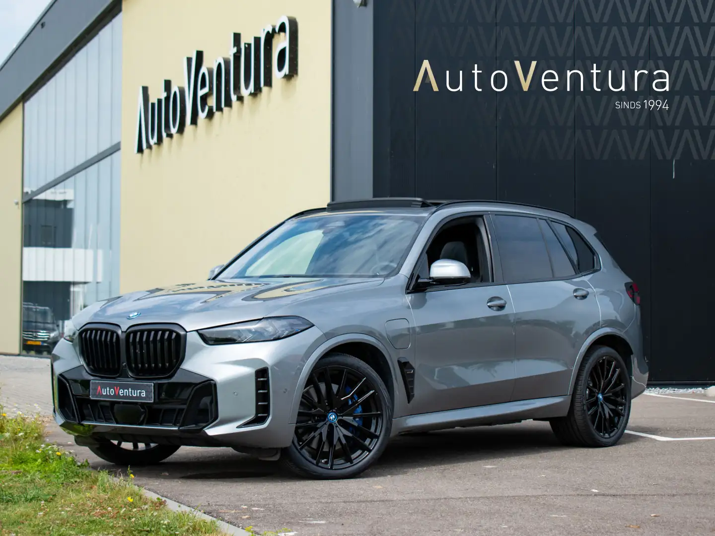 BMW X5 50e M-Sport Pro | Soft close | Luchtvering | Harma Gris - 1