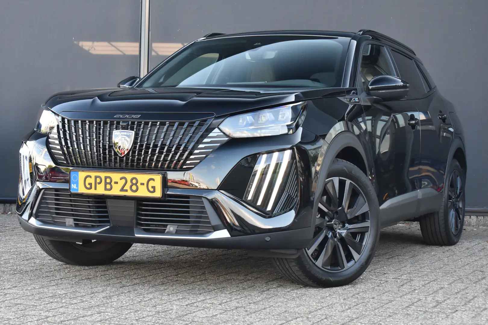 Peugeot e-2008 EV GT 54 kWh 3-Fase! | Navigatie | Sfeerverlichtin Negru - 1