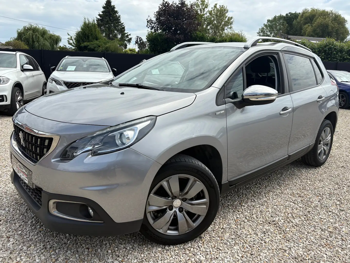 Peugeot 2008 1.2i*STYLE*NAVI*PDC*AIRCO*CRUISE*BLUETOOTH*MEDIA* Grijs - 2