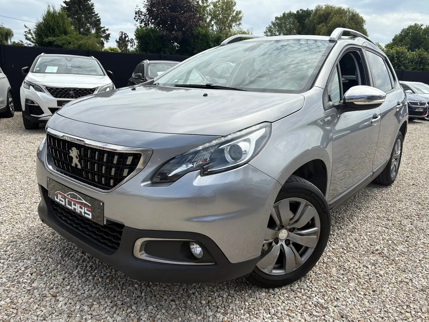 Peugeot 2008 1.2i*STYLE*NAVI*PDC*AIRCO*CRUISE*BLUETOOTH*MEDIA* Grijs - 1