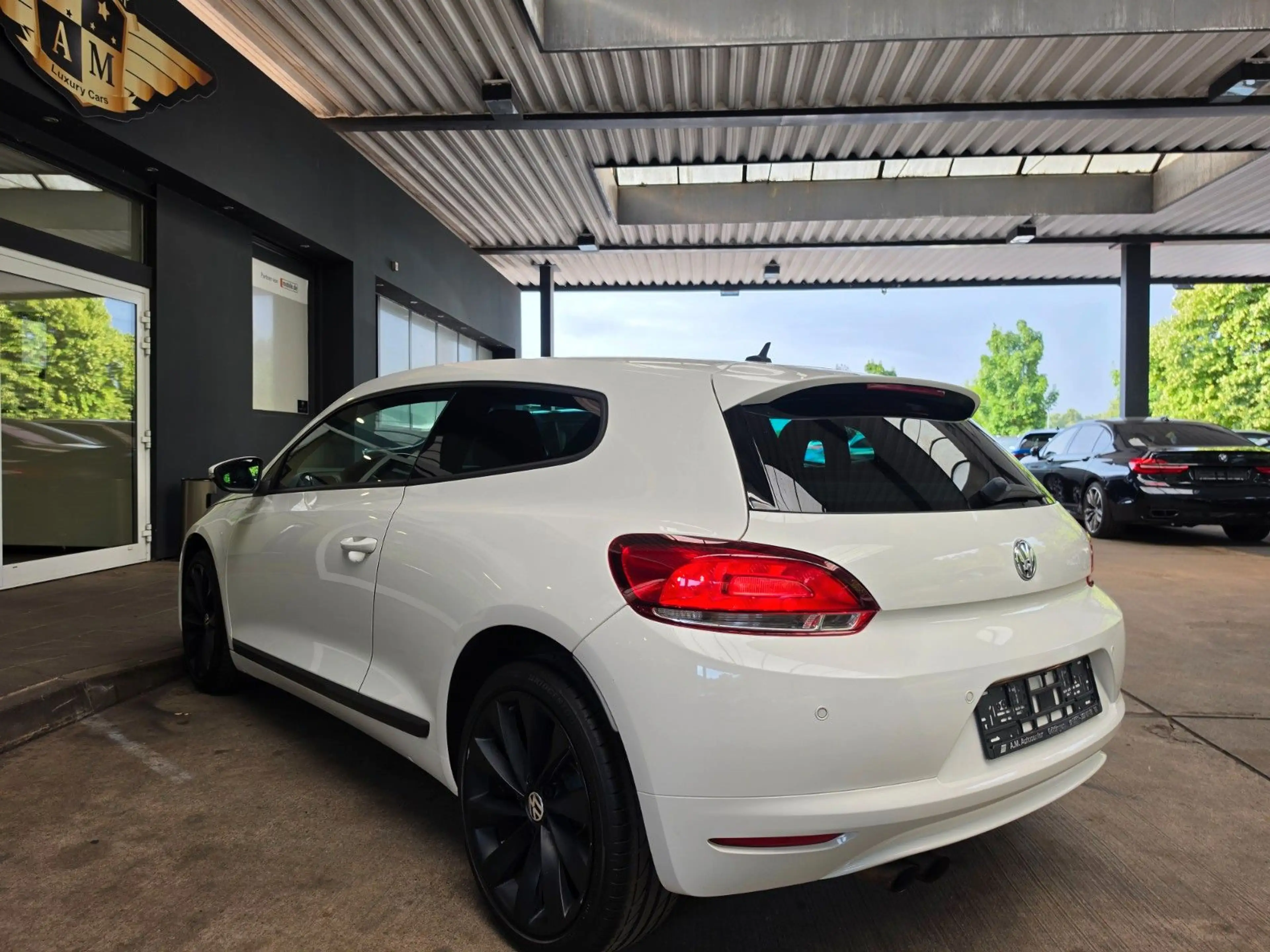 Volkswagen Scirocco 1.4 TSI Sport DYNAUDIO/LED/DCC/Park/18" — photo 14