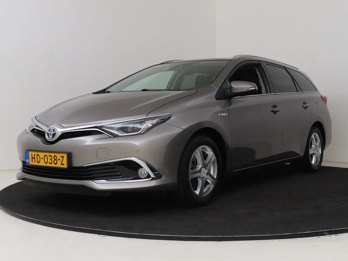 Toyota Auris Touring Sports 1.8 Hybrid Lease pro I Navigatie I Brun - 1