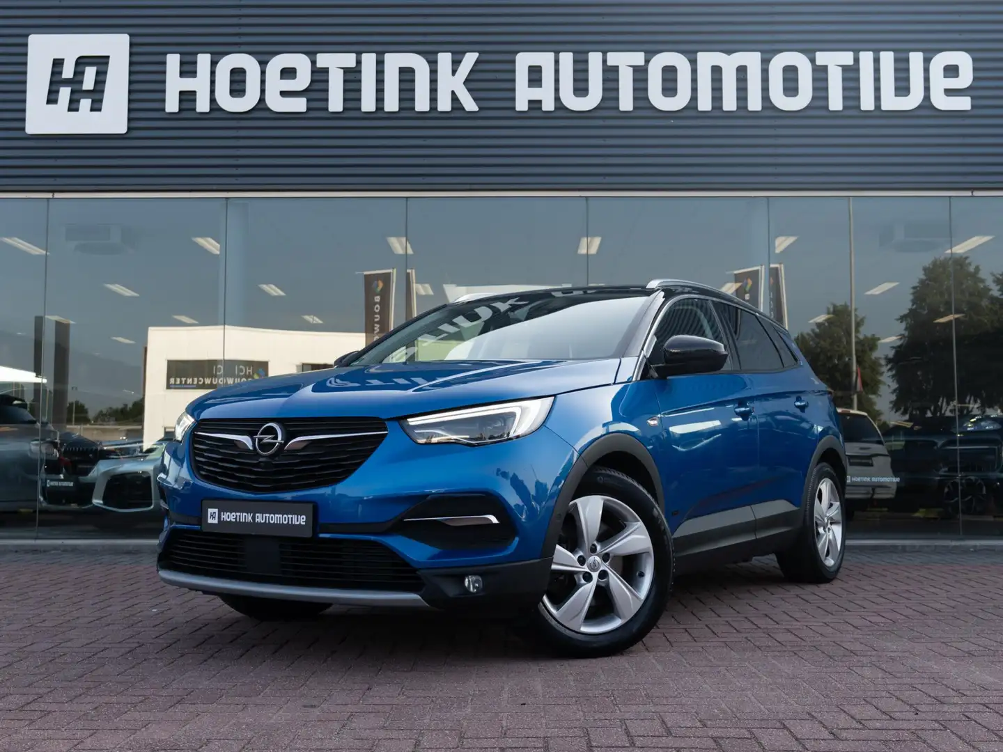 Opel Grandland X 1.6 Turbo Hybrid4 Business Executive | Denon | Amb Blauw - 1