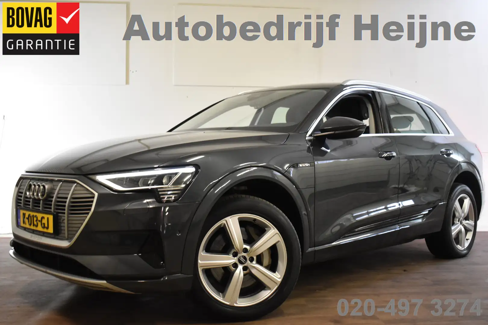 Audi e-tron 50 QUATTRO BUSINESS EDITION 71 kWh CAMERA/MEMORY/L Grijs - 1