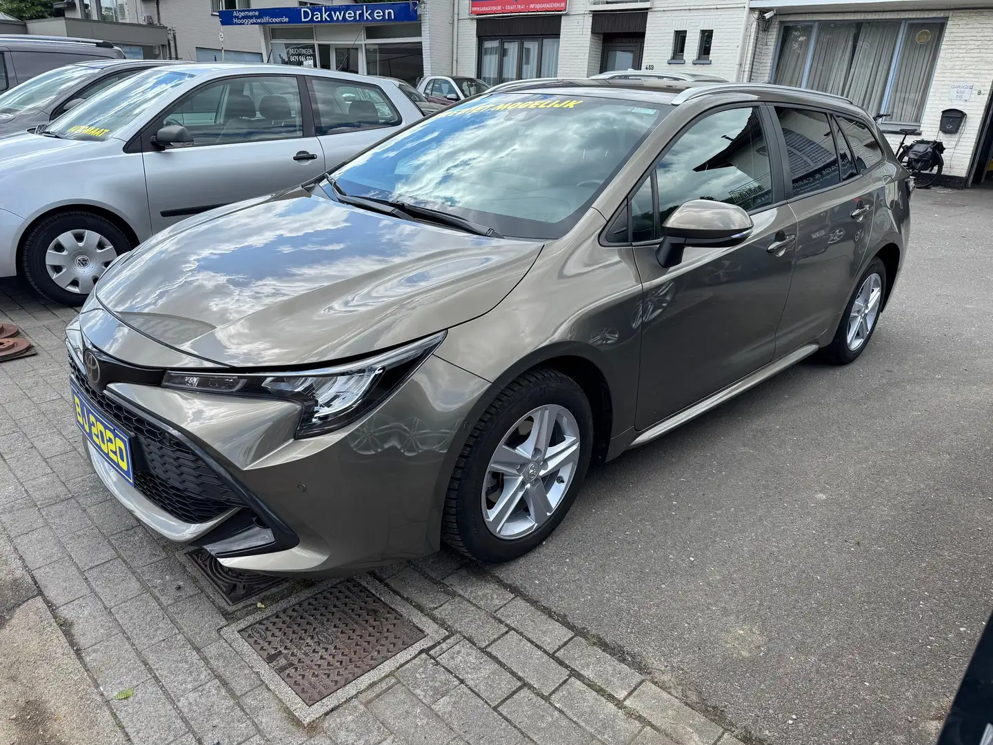 Toyota Corolla SW 1.2 Turbo CRUISE AIRCO CAMERA MET GARANTIE Brons - 2