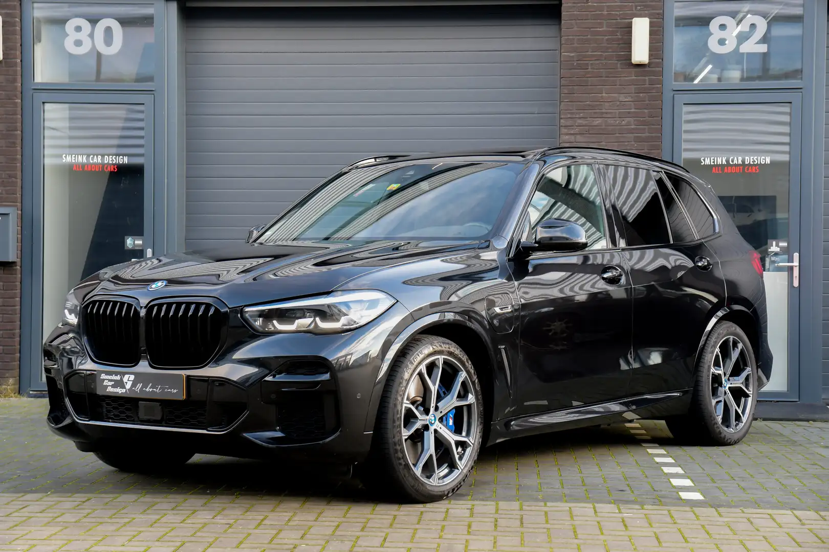 BMW X5 xDrive45e M-Sport | Pano | Garantie Zwart - 1