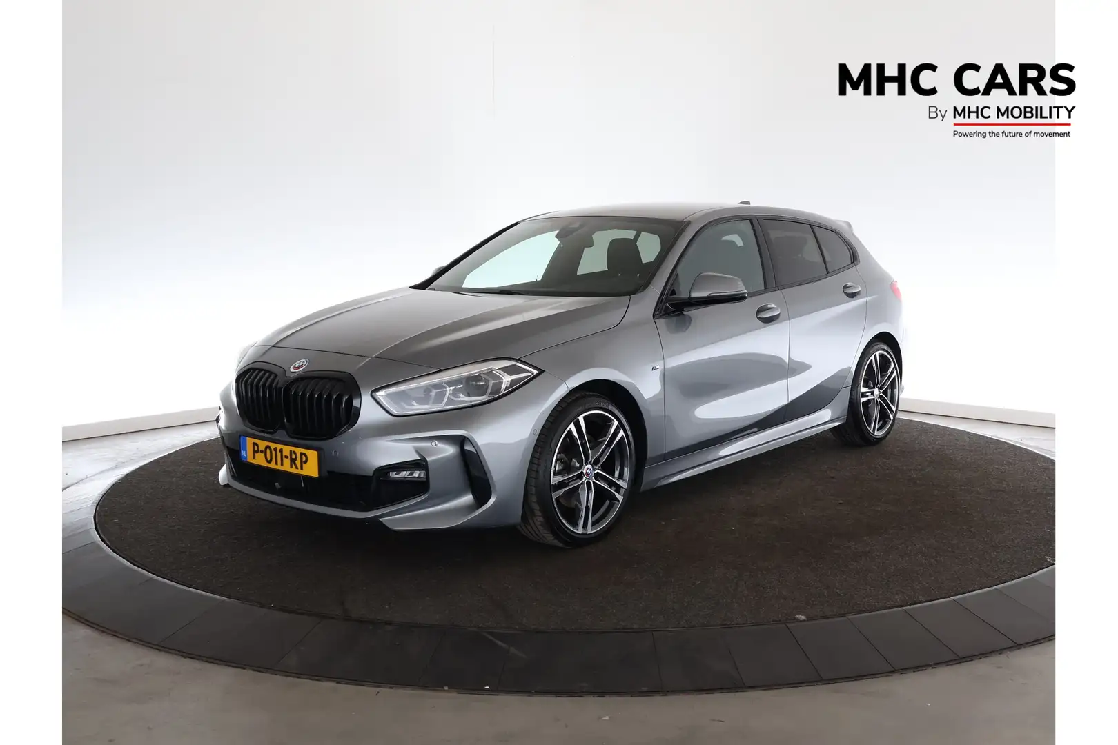 BMW 118 1-serie 118i Executive | M-pakket | Trekhaak | Cam Grijs - 1