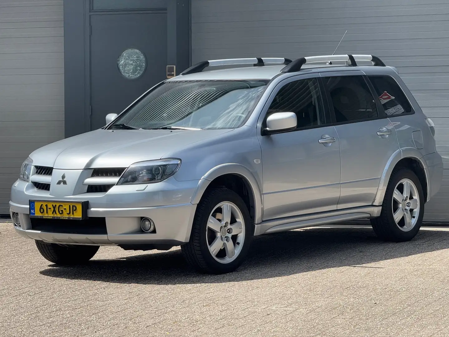 Mitsubishi Outlander Sport 2.4 Invite Scott 4WD Grijs - 1