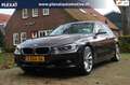 BMW 320 3-serie 320i High Executive Aut. | Adaptieve Cruis Bruin - thumbnail 1