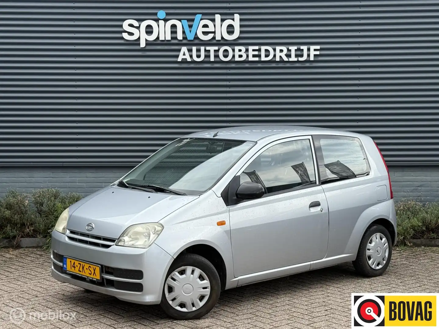 Daihatsu Cuore 1.0-12V 100th Anniversary - Stuurbekrachtiging - A Grau - 1