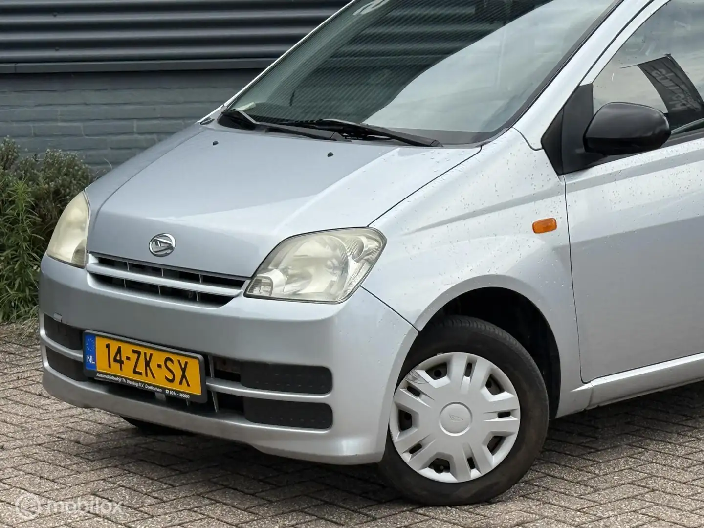 Daihatsu Cuore 1.0-12V 100th Anniversary - Stuurbekrachtiging - A Grau - 2