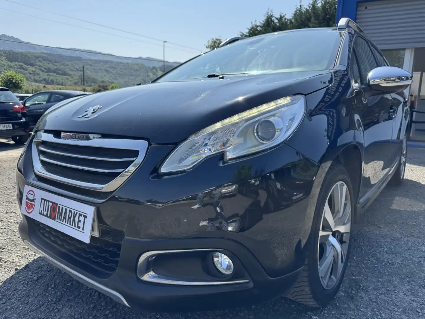 Peugeot 2008 1.6 e-HDI Allure Zwart - 1